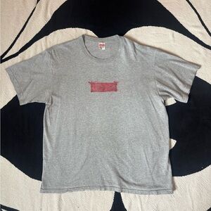 Supreme Gray T-Shirt with Red Graphic